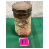 Vtg. container and steelies