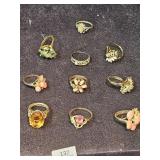 (9) Gold Tone Rings