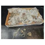Flat of Silver Toned Jewelry