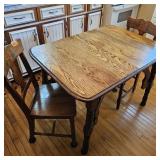 Table and 4 Chairs-Kitchen(one Chair needs repair)