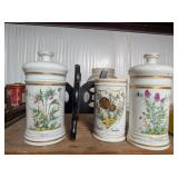 (3) Hand Painted Canisters, Bottom of a Display