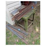 Wood Table and Metal Scrap on Table & Ground