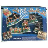 Noma Here Comes Santa Lights, Music, Motio