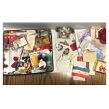 Assorted Brooches, Pins, Ribbons in Tin