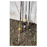 Lot of Fishing Poles and Reels