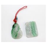 Two Carved Jadeite Pendants