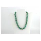 A TURQUOISE BEAD NECKLACE