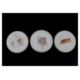 Three Ceramic Trivets w/ Floral & Portrait Motifs