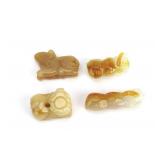 Group of Four Small Jade Pendants