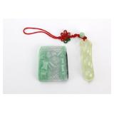 Two Carved Jadeite Pendants