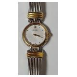 Seiko V400-4391 R2 gold and silver tone watch