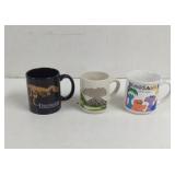 Dinosaur coffee Mugs , black one has Chip on