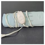 Sunbeam electric heating pad with a blue cover