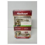 Gold tone Kwikset hall closet door handle