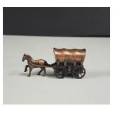Copper tone covered wagon pencil sharpener