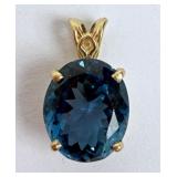 14Kt. Gold Scroll Design Blue Topaz Pendant