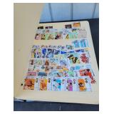 Binder of Assorted Stamps