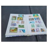 Binder of Assorted Stamps