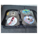 Binder of Assorted DVDs