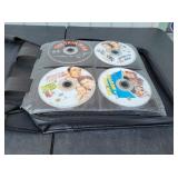 Binder of Assorted DVDs