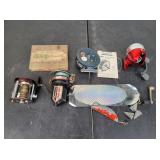 (4) Assorted Fishing Reels & More