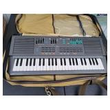 Yamaha PortaSound PSS-460 Keyboard in Lacoste Bag