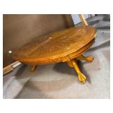 Coffee table with clawed feet