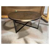 Round coffee table with metal legs