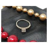 .925 SILVER RING WITH ROCKS MARKED 925 NVC 10