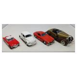 4 COLLECTABLE MODEL CARS