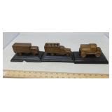 3 VINTAGE BRASS BADCOCK PROMO TRUCKS