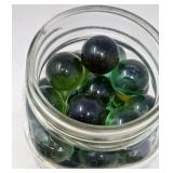 JAR OF LARGE DARK GREEN MARBLES APROX 3/4'