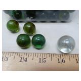 JAR OF LARGE DARK GREEN MARBLES APROX 3/4'