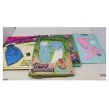 NOS 6 UNOPENEED PACKS OF DOLL CLOTHES