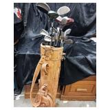 LEATHER GOLF BAG WITH 20 MISMATCHED CLUBS