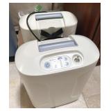 A PAIR OF OXYEGEN MACHINES (INOGEN AT HOME)