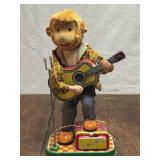 Monkey in Jeans Playing Guitar Tin Toy