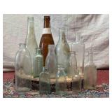Assortment of Vintage and Antique Bottles