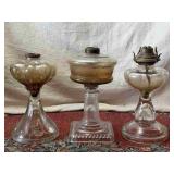 Three Clear Glass Oil Lamps