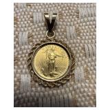 5.00 GOLD COIN WITH 14 K GOLD BEZEL