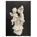 Italian White Porcelain Musical Cherub Candlestick