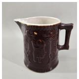 Antique Rockingham Glazed Relief-Molded Pitcher