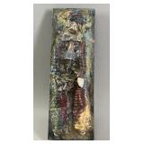 A mid century Carmen Touqas Poulin Plaque