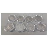 Eight Assorted Kennedy Half Dollars