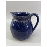 Victorian-era cobalt blue glazed ceramic pitcher