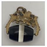 Fine gold-tone watch fob charm featuring a