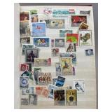 Collection of VTG World Postal Stamps in Red Book