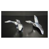 Cast from solid aluminum with a polished finish.