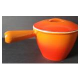 Cast iron enamel Le Creuset fondue pot flame