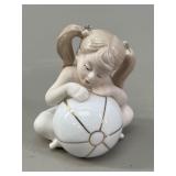 Glazed Porcelain Figurine of Girl with Beach Ball